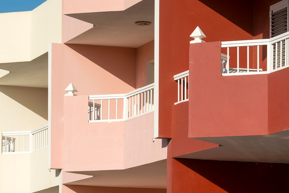 Painted building facade with balconies